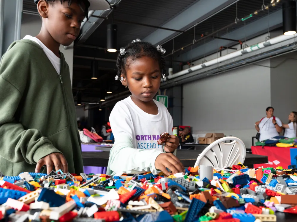 Girl playing with legos